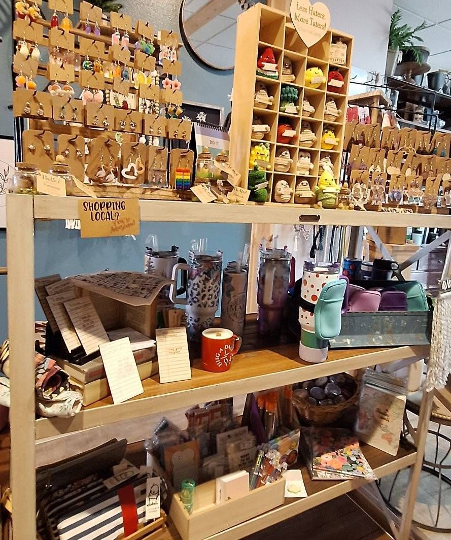 A boat is sitting on a trailer in a garage.