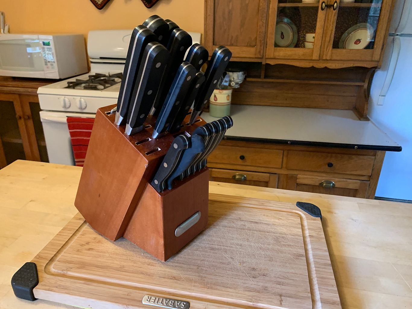 set of knives in wooden knife block