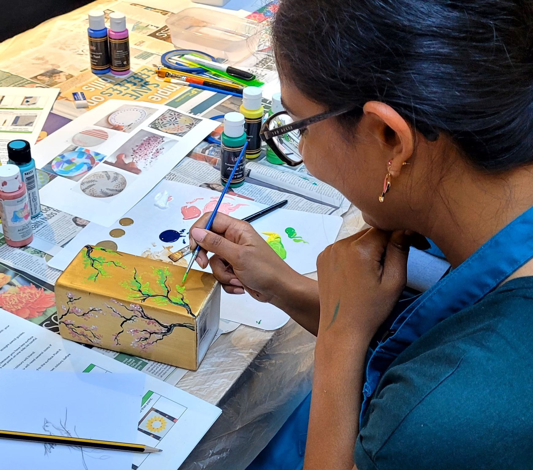 In-person pottery decorating team building workshop