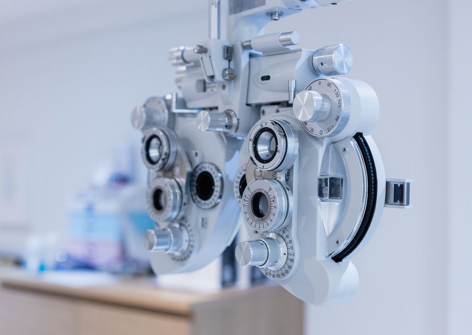 A close-up of an eye examination machine in an ophthalmologist 's office