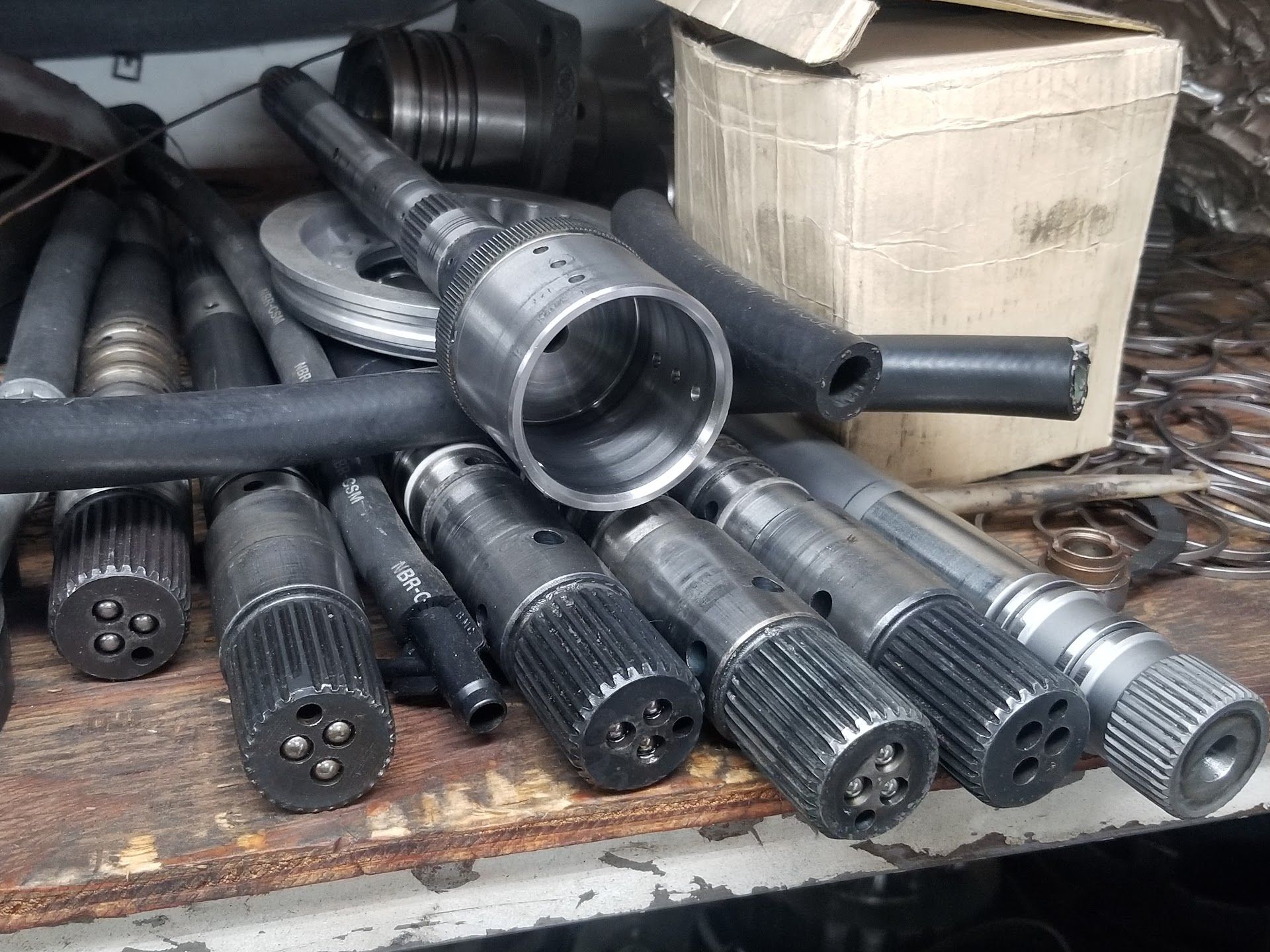 A pile of metal machine parts | Riley Auto Care & Transmissions