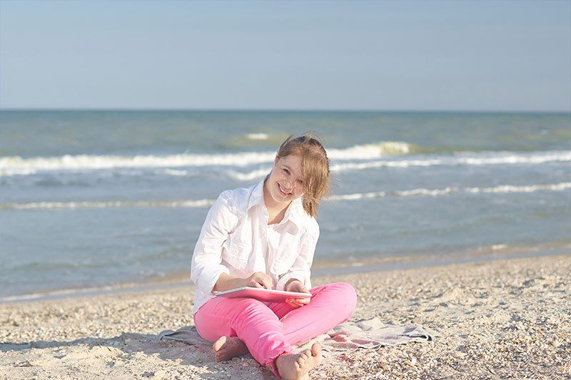 down syndrome girl on beach