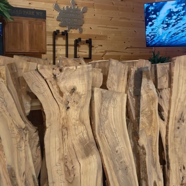 A bunch of wooden boards are stacked on top of each other