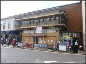 A shop with scaffolding outside