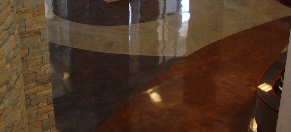 A Close up Of a Marble Floor in A Room with A Brick Wall - Tuscaloosa, AL - Jeffco Concrete Contractors