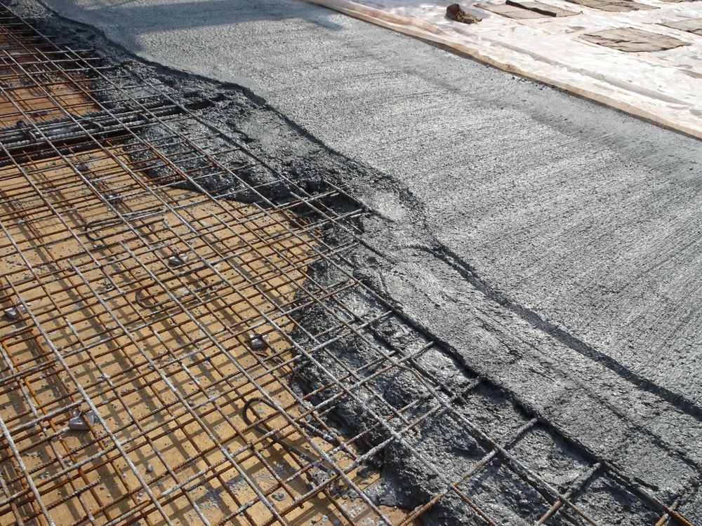 Concrete Poured Over Rebar Mesh — Damon's Earthworks in Chatsworth, QLD