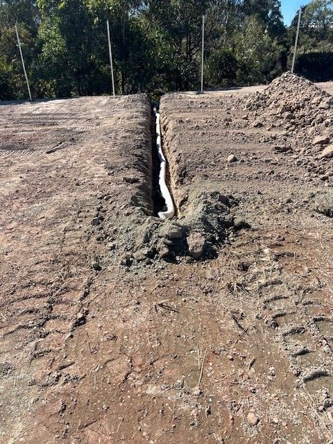 Construction Workers in a Trench — Damon's Earthworks in Chatsworth, QLD