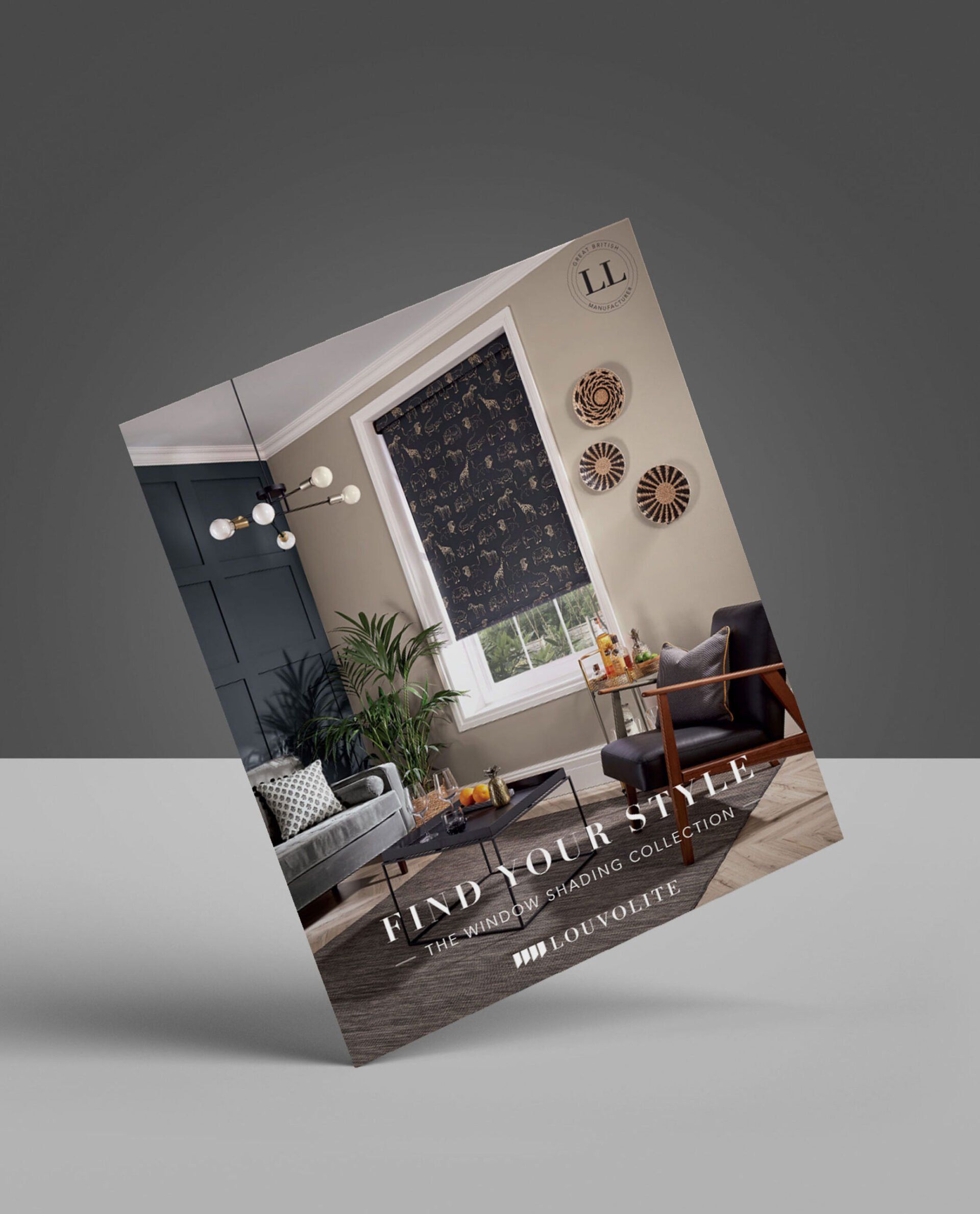 A brochure is sitting on a table with a picture of a living room.