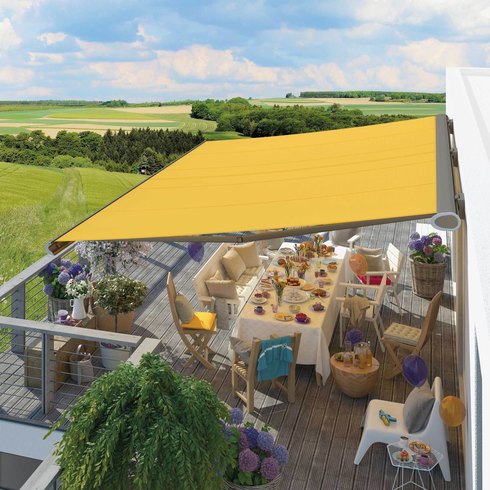 A patio with a table and chairs under a yellow awning