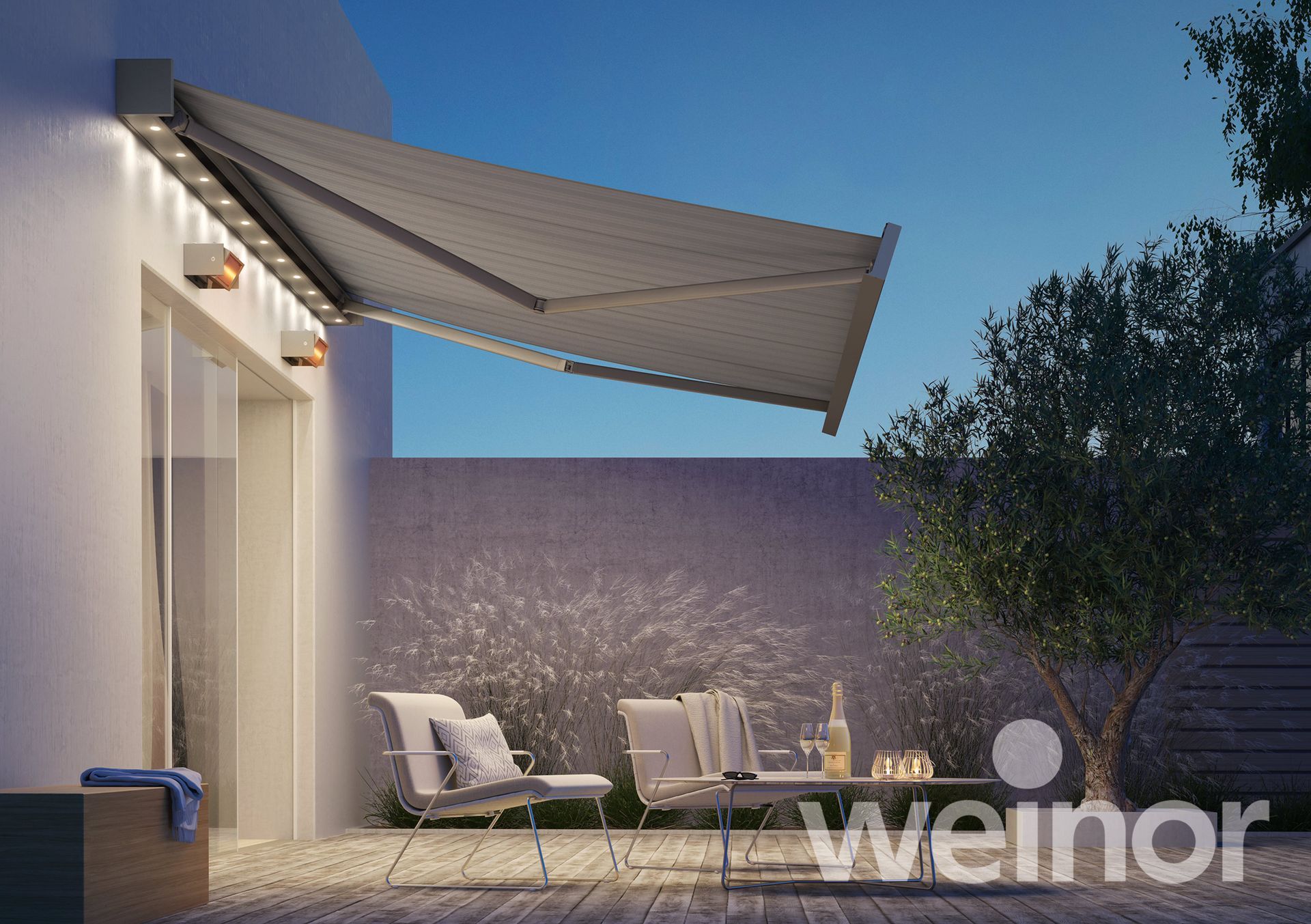 A white awning is covering a patio with chairs and a table.