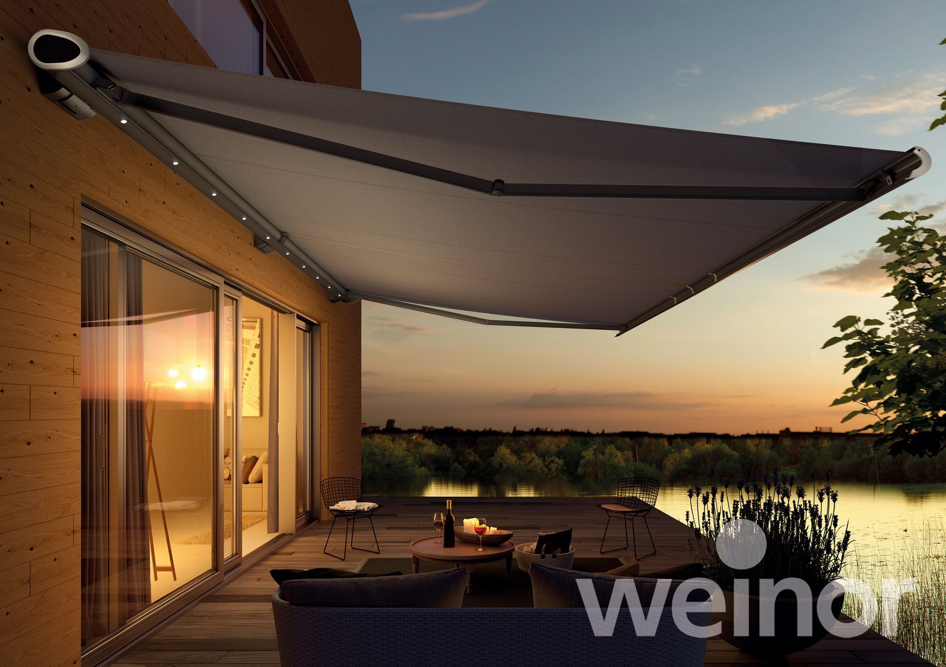 A patio with a weinor awning over it