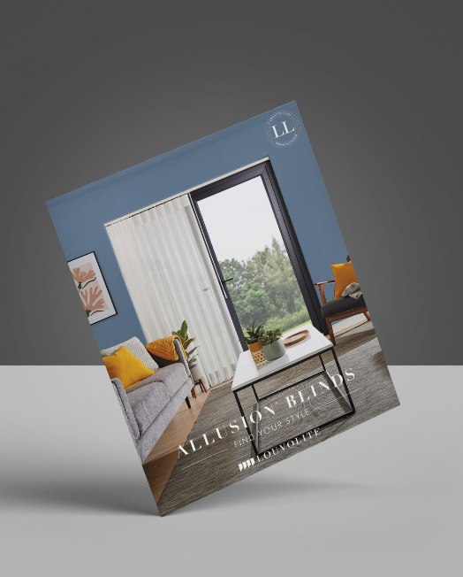 A brochure for allusion blinds is sitting on a table.