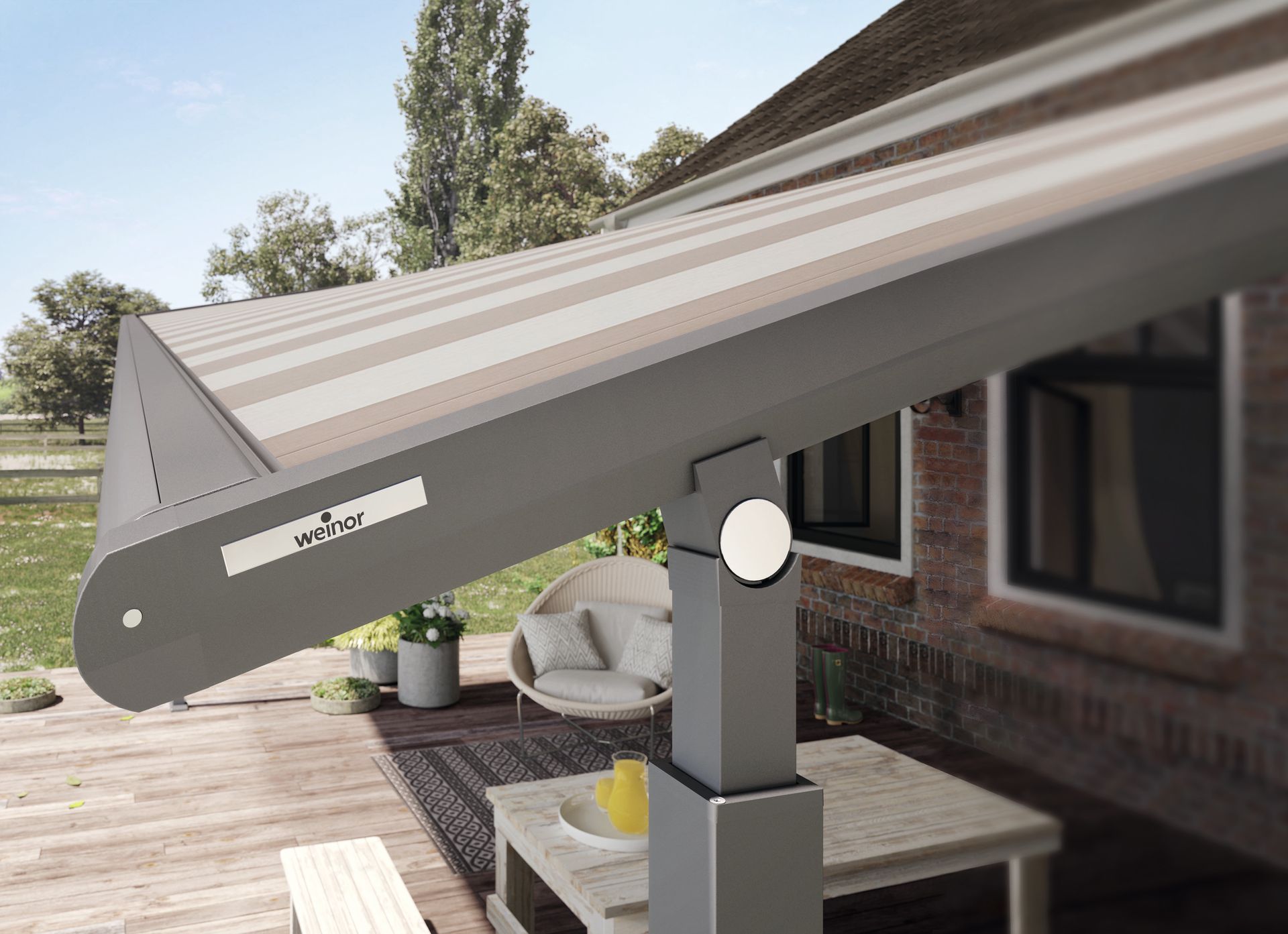 A patio with a canopy over it and a table and chairs.