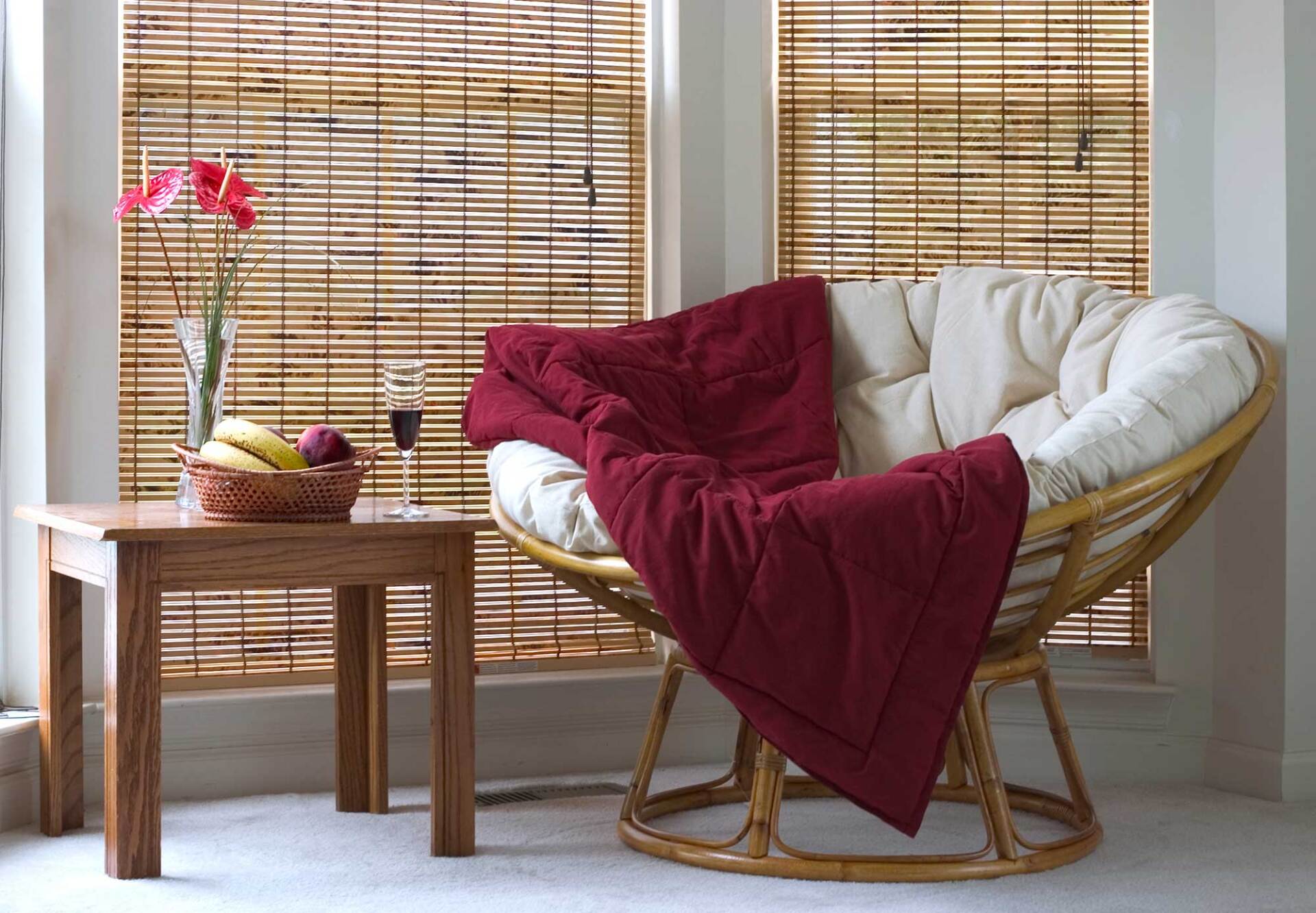 Papasan Chair Near Coffee Table with Wine and Fruits — St. Louis, MO — Overland Shade Co.