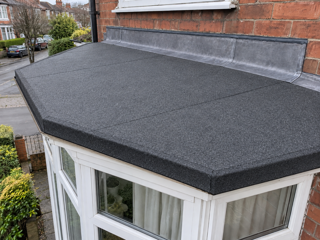 Bay window roof re-covered by Roofers Irlam