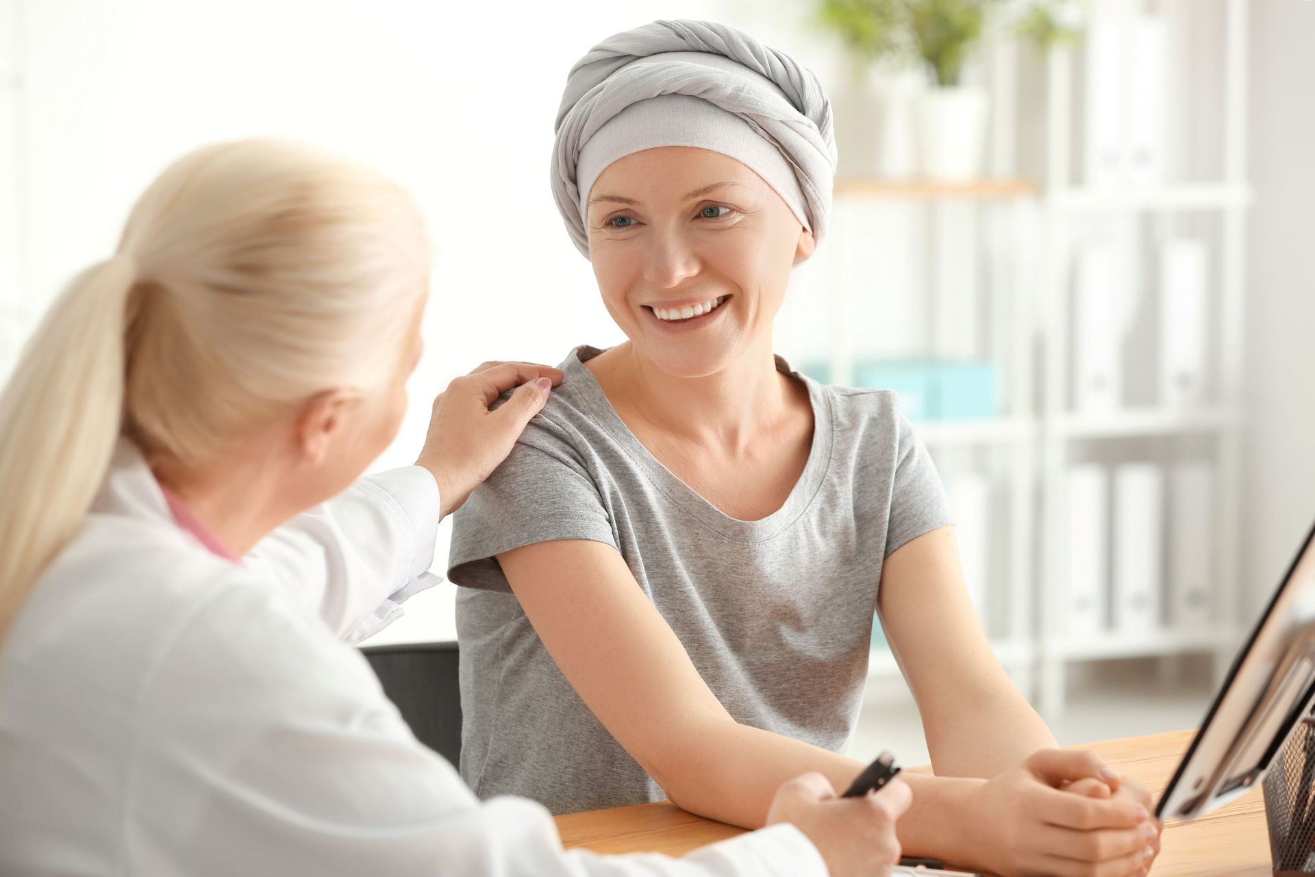 A woman after chemotherapy visiting an oncology doctor in the hospital.