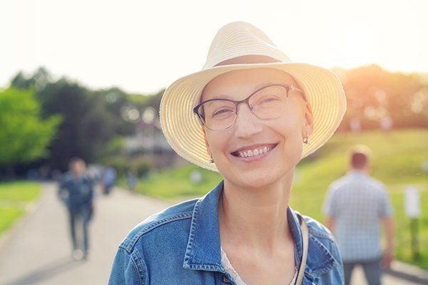 Woman In Hat And Casual Clothes Enjoying Life — Bethlehem, PA — Salib Oncology