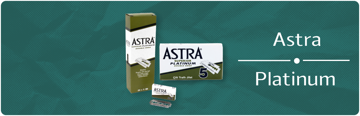 A picture of astra platinum razor blades on a green background.