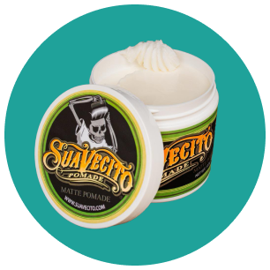 A jar of suavecito pomade on a blue background