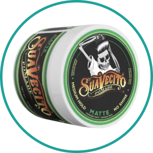A jar of suavecito pomade with a skull on it