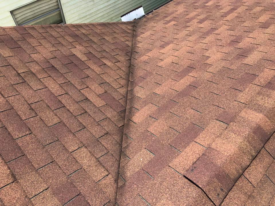 A close up of a roof with shingles on it.