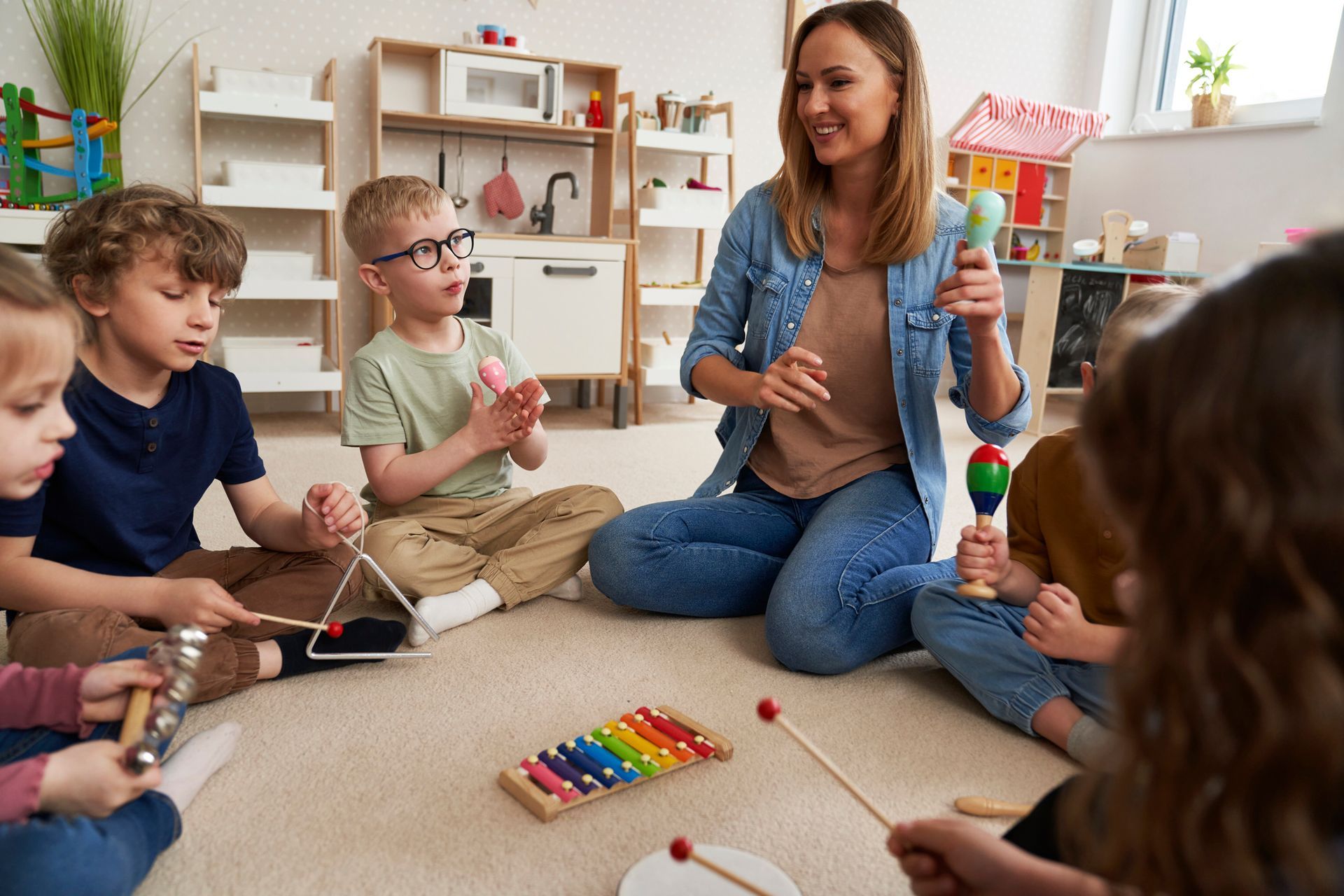 Children having music classes with musical instruments. — Holmesville, NSW — Holmesville Playhouse Preschool Children having music classes with musical instruments. — Holmesville, NSW — Holmesville Playhouse Preschool