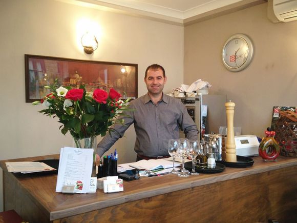 The owner of san Lorenzo welcoming guests in Sheffield