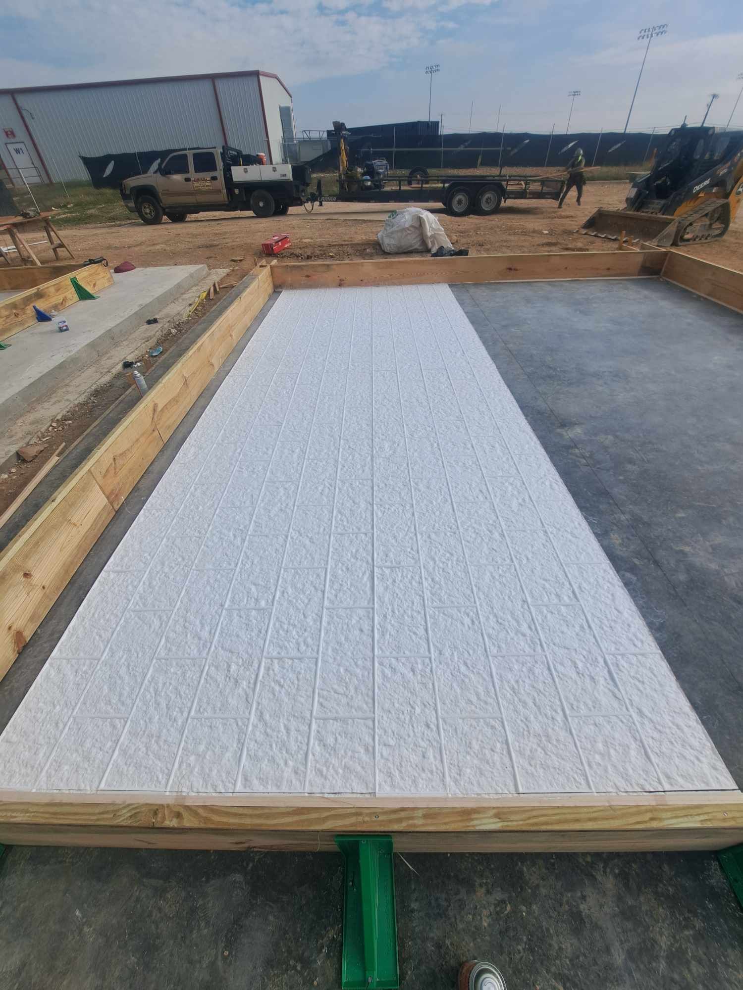 A large piece of styrofoam is sitting on top of a wooden table.