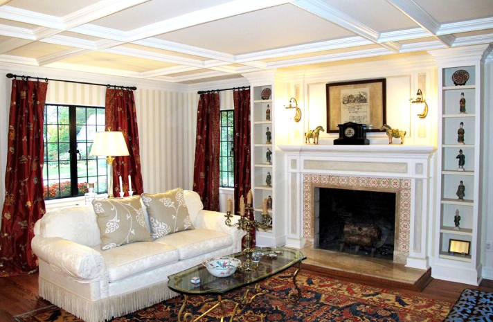 A living room with a fireplace and a couch