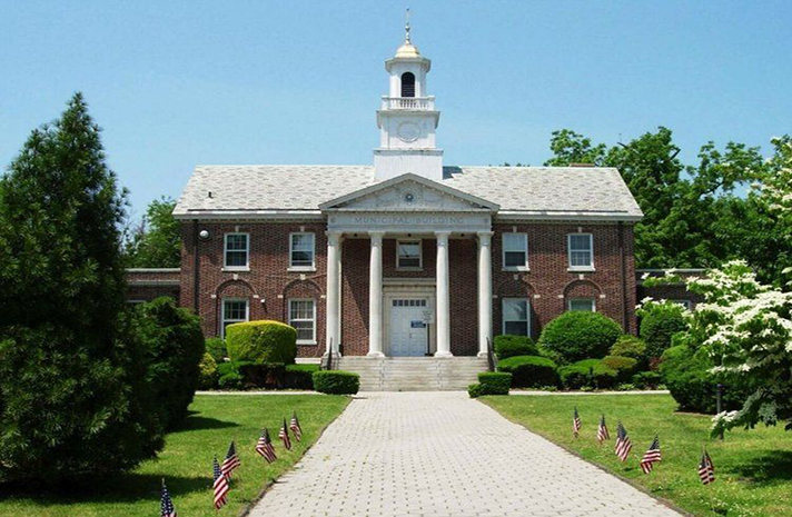 A large brick building with a clock tower on top of it