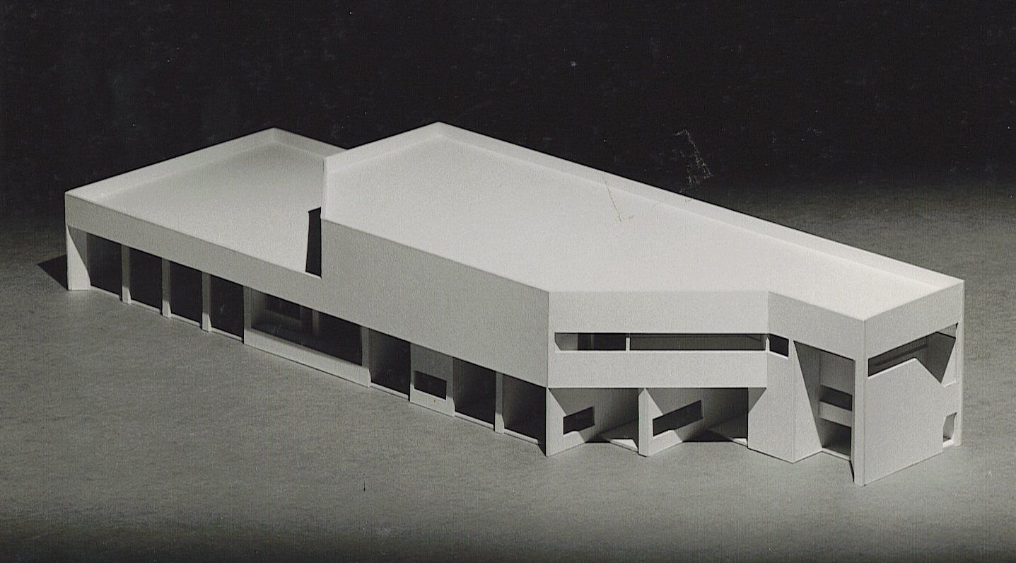 A black and white photo of a model of a building