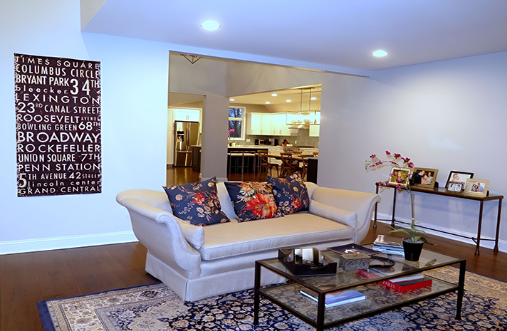 A living room with a couch and a coffee table