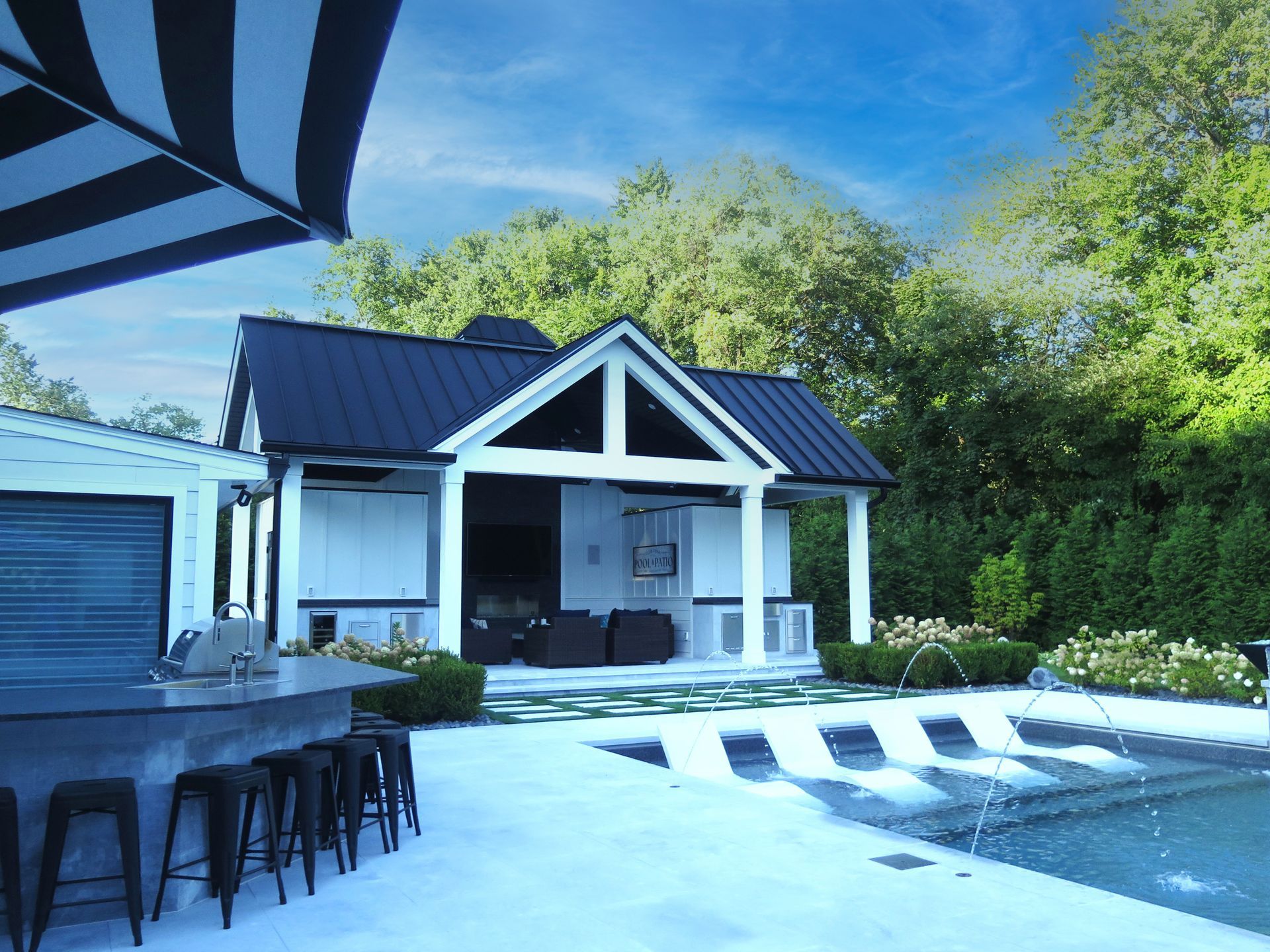 A hallway with stairs and a table in the middle