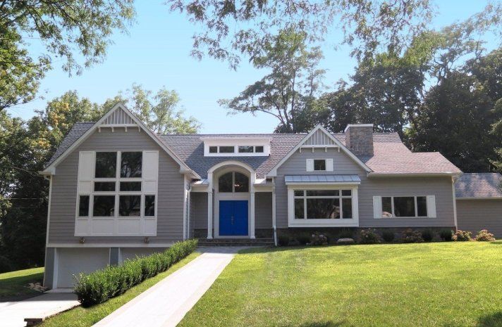 The front of a house with a blue door