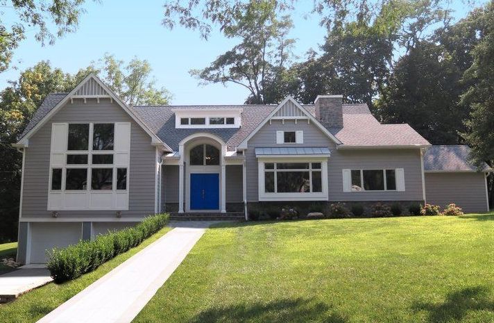 The front of a house with a blue door