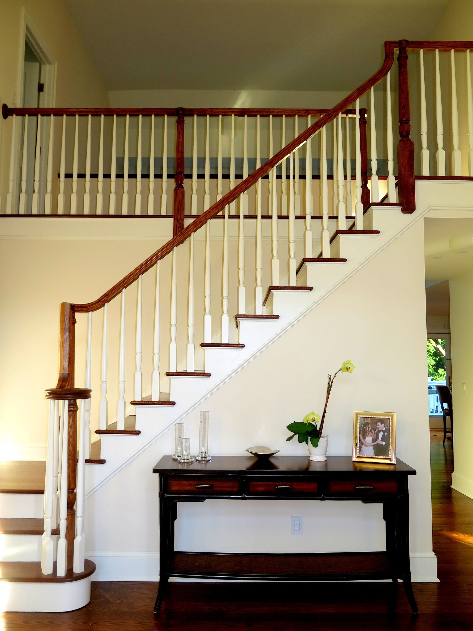 A staircase with a picture of a couple on it