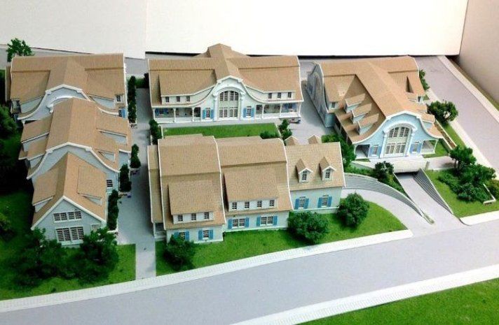 A model of a residential area with houses and trees