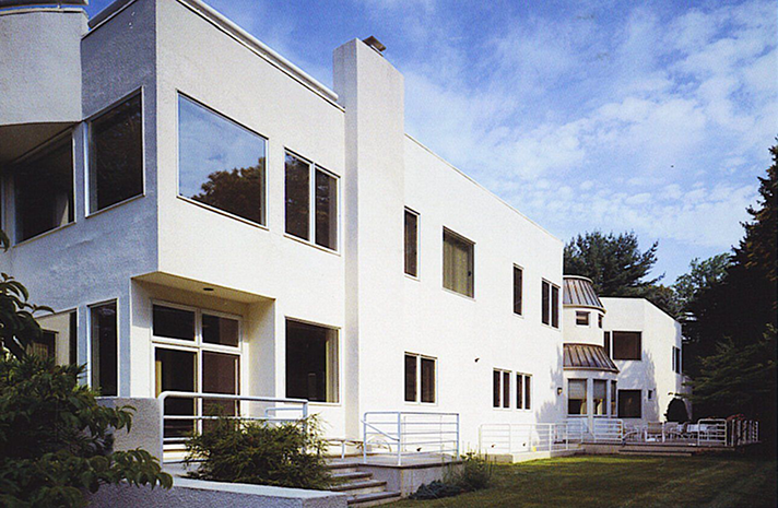 A large white building with a lot of windows