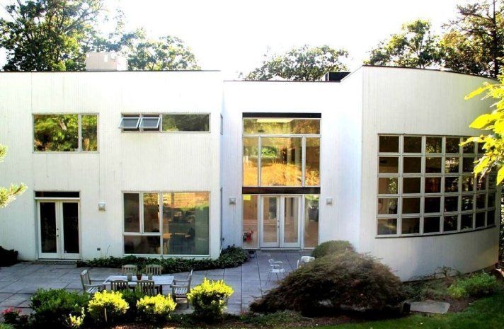 A large white house with a lot of windows