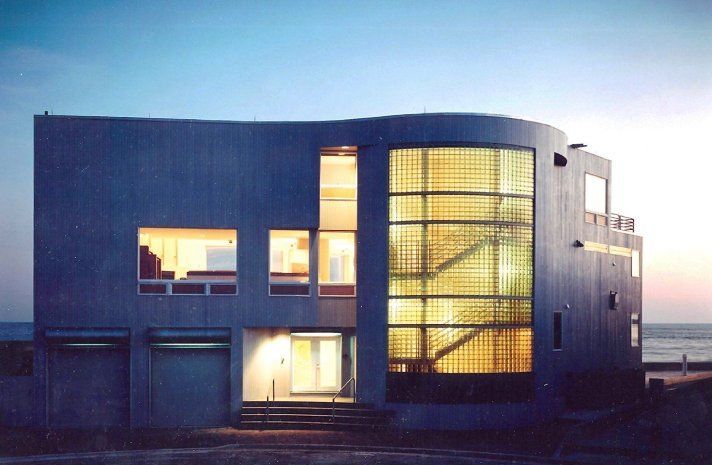 A large building with a lot of windows and stairs