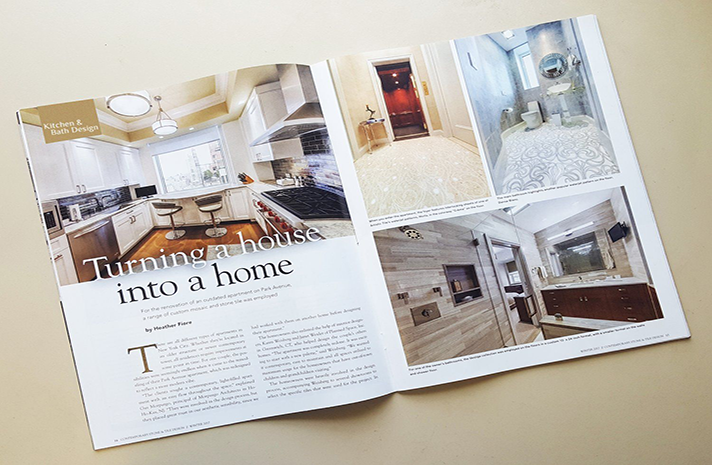 A magazine is open to a page about turning a house into a home.