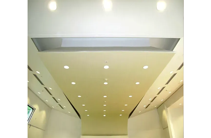 A ceiling with a lot of lights on it