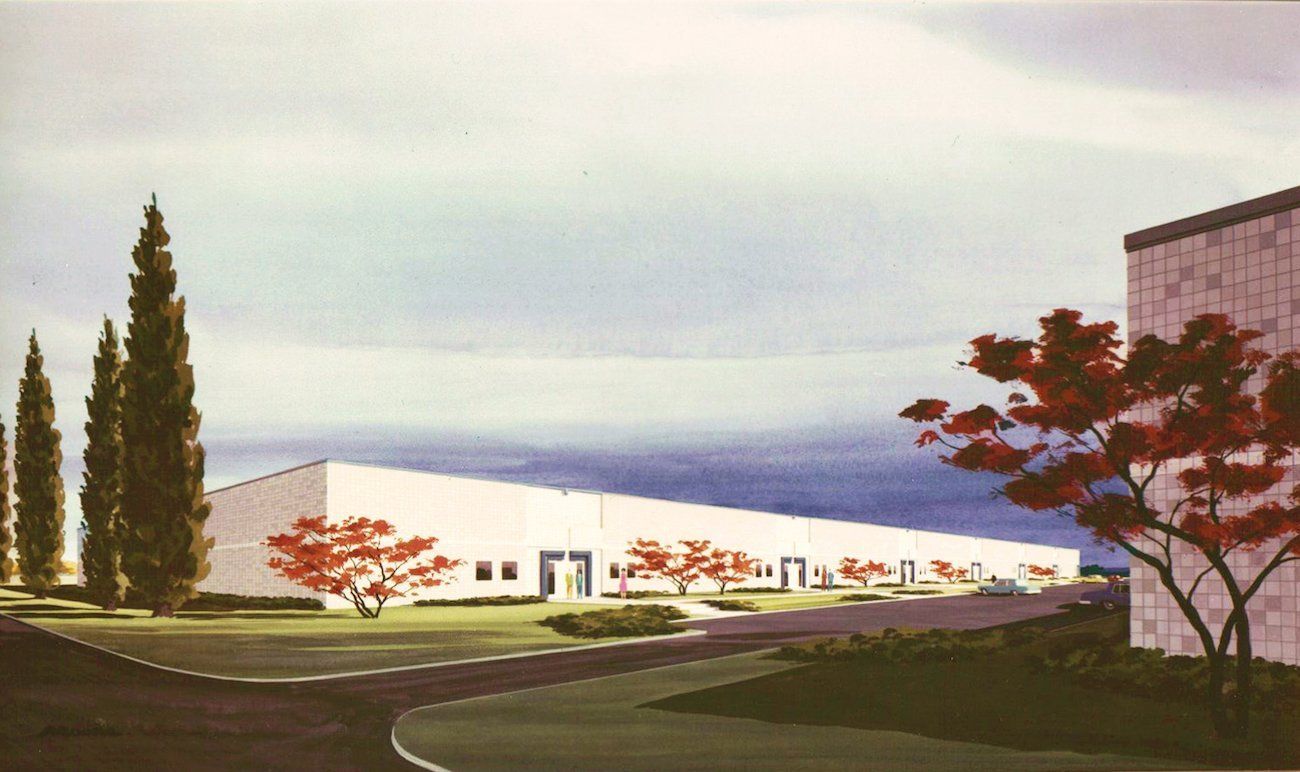 An artist 's impression of a large white building