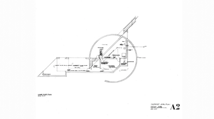 A black and white drawing of a building on a white background.