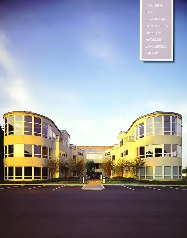 A picture of a building with a blue sky in the background