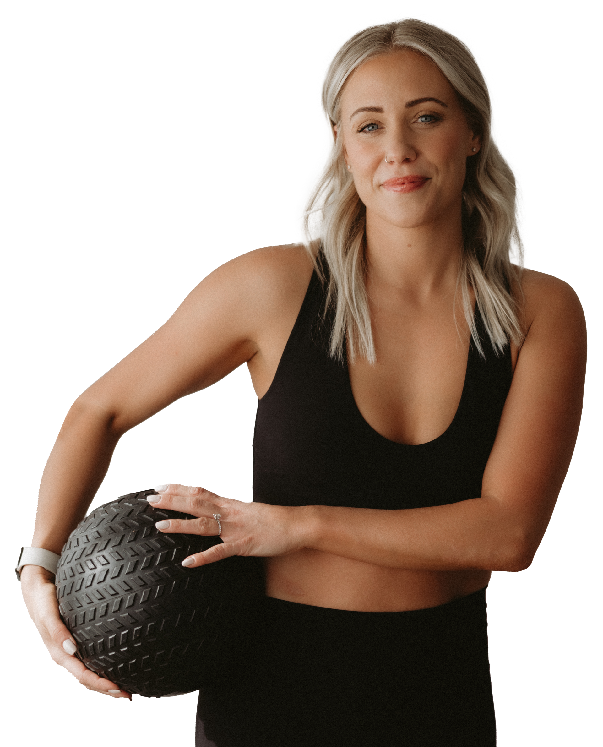 A woman in a black tank top is holding a black ball. Forever Fit - personalised Nutrition and Training. Terrina