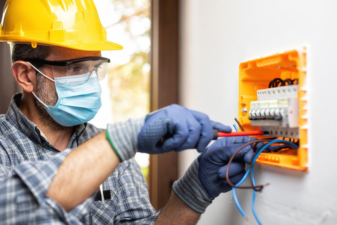 Electrician Fixing Wires — East Brunswick, NJ — Diamond Electric Services