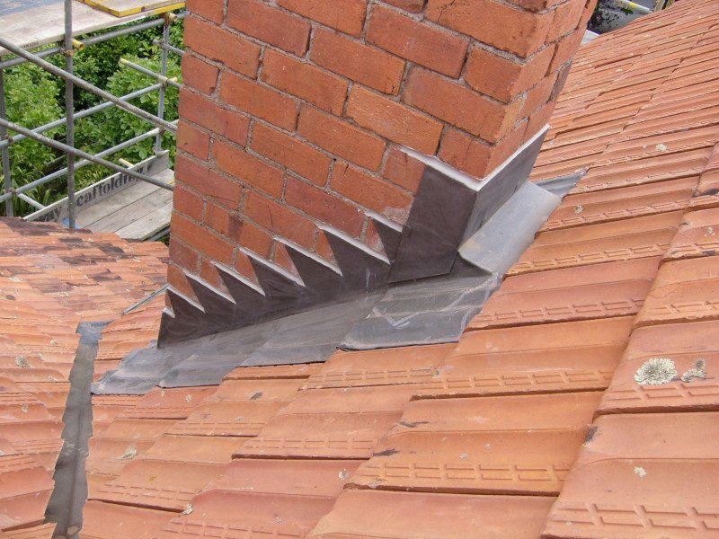 chimney stack with stepped flashing
