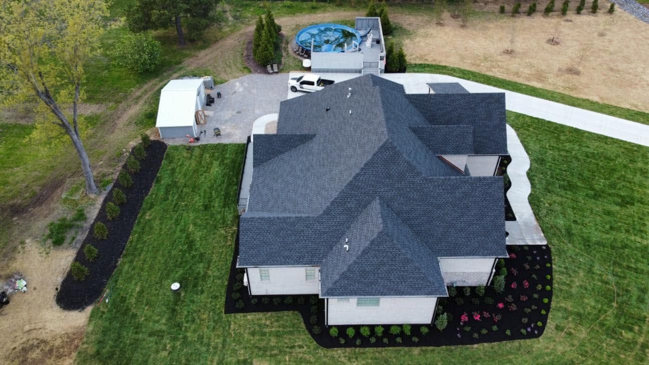 aerial view of new home with new sod and landscaping