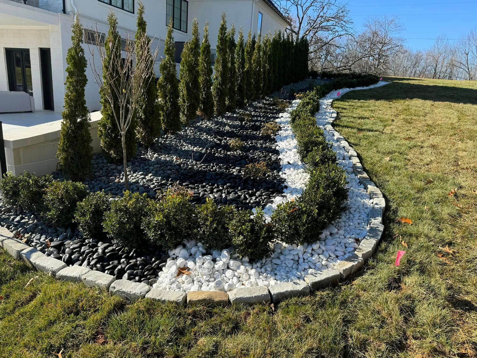 flowerbed with two toned rocks